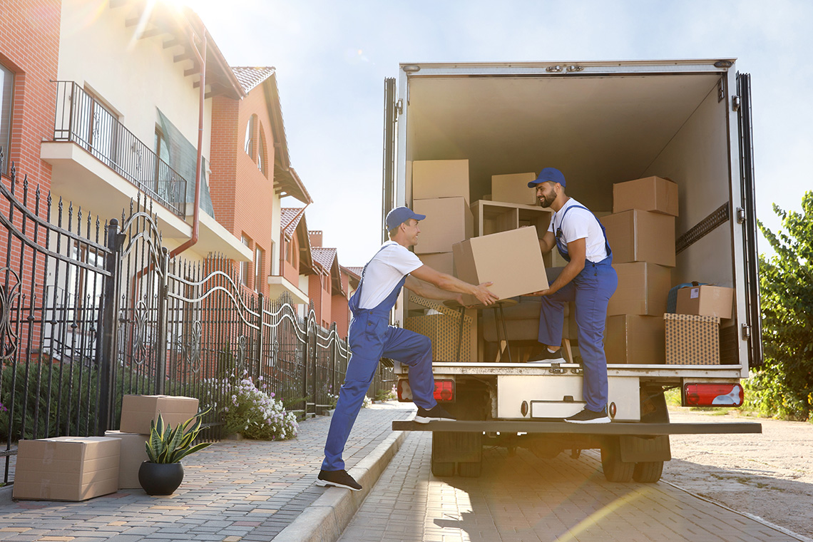 Workers unloading boxes