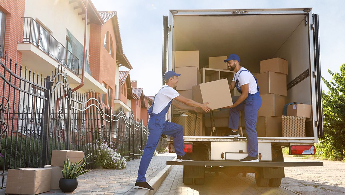Workers unloading boxes